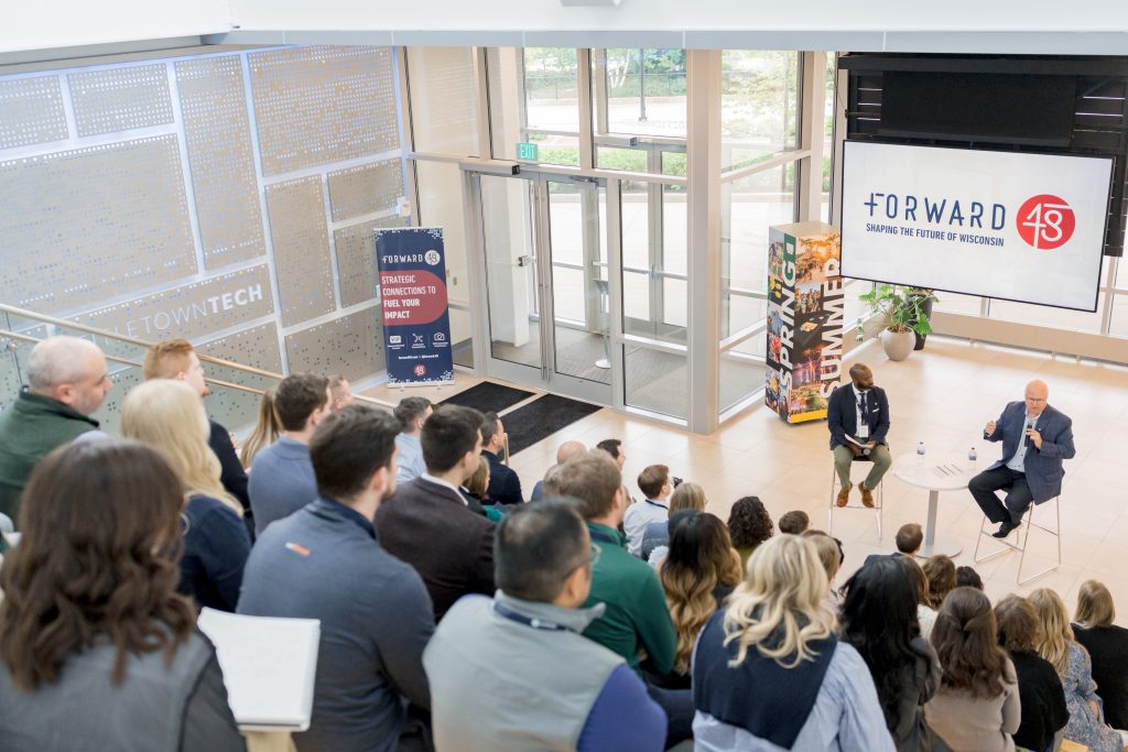 The Forward 48 Spring 2025 Cohort at Titletown Tech in Green Bay, Wisconsin listening to Faculty Speaker Craig Dickman.